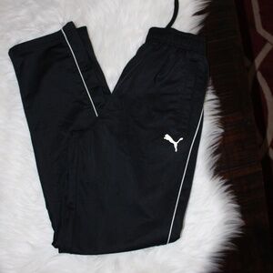 PUMA, black with a white stripe down the side athletic pants  Large 14-16